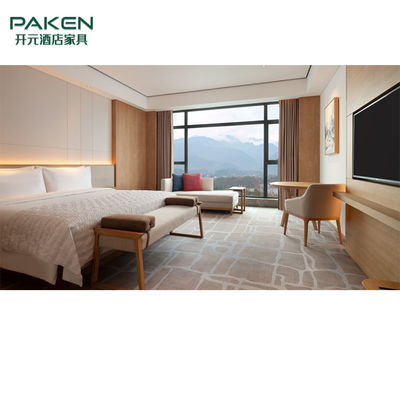 Προσαρμοσμένη σύγχρονη κρεβατοκάμαρα επίπλων δωματίου ξενοδοχείου που τίθεται για το πέντε αστέρων ξενοδοχείο πολυτελείας